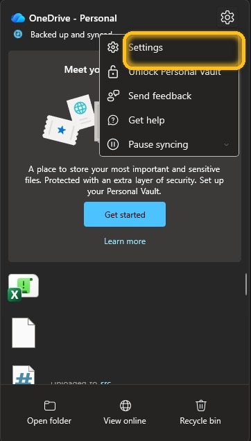 เมนู Settings ของ OneDrive เปิดจากไอคอนรูปเฟือง มีตัวเลือก Pause syncing