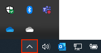ลูกศรแสดงไอคอนที่ซ่อนอยู่บน Taskbar ของ Windows คลิกเพื่อดูไอคอน OneDrive ที่ซ่อนอยู่