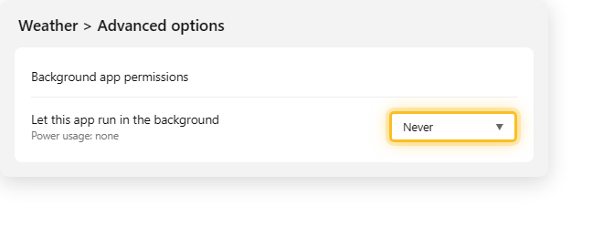 ตั้งค่า Background app permissions เป็น Never ในหน้า Advanced options บน Windows 11