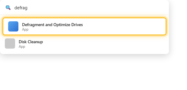 ค้นหา defrag ใน Start menu แล้วเปิด Defragment and Optimize Drives บน Windows 11